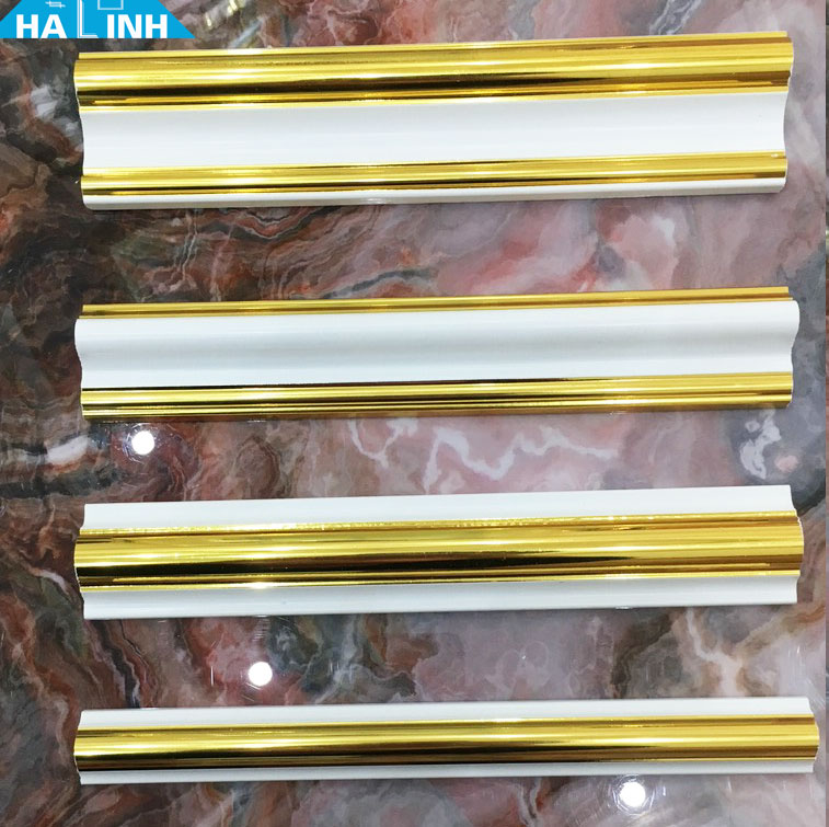 phào chỉ ps trắng chỉ vàng 